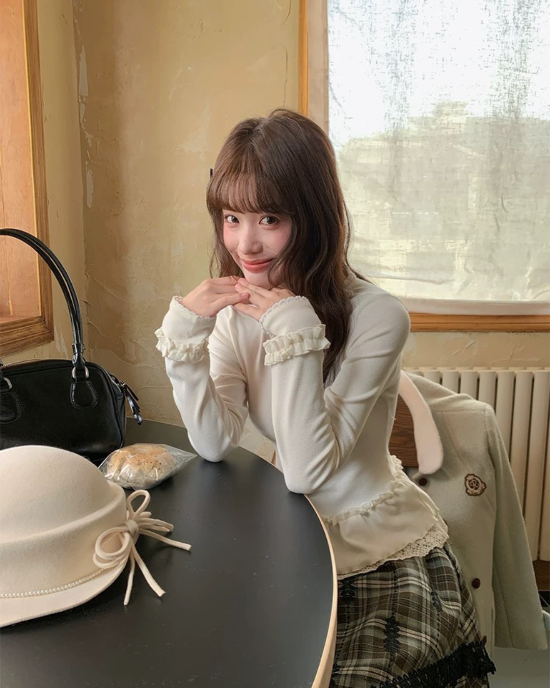 ニットフリルレイヤートップス